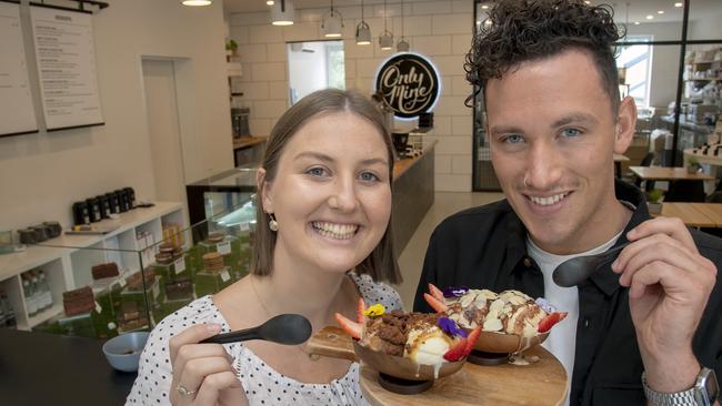 Anna Crosthwaite and Jarryd Pentony taste-test the special Easter Sundae. Picture: Andy Brownbill