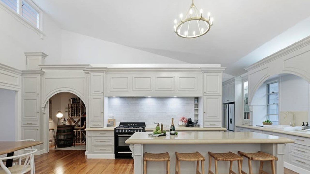 The stunning kitchen with a butler’s pantry and wine cellar