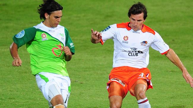 TOWNSVILLE, AUSTRALIA - DECEMBER 18: Shane Stefanutto of the Roar contests the ball with David Williams of the Fury during the round 19 A-League match between the North Queensland Fury and the Brisbane Roar at Dairy Farmers Stadium on December 18, 2010 in Townsville, Australia. (Photo by Ian Hitchcock/Getty Images)