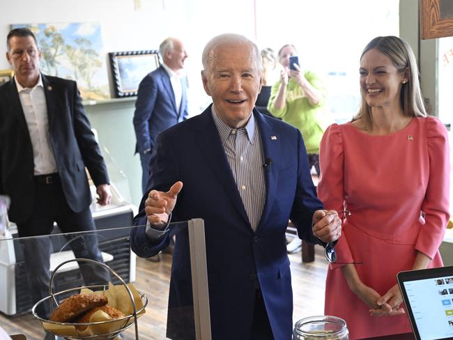 TOPSHOT - US President Joe Biden visits Zummo's Cafe with Scranton, Pennsylvania, Mayor Paige Cognetti before departing for Pittsburgh, on April 17, 2024. Biden is traveling to Pittsburgh, Pennsylvania, to meet with steelworkers. (Photo by ANDREW CABALLERO-REYNOLDS / AFP)