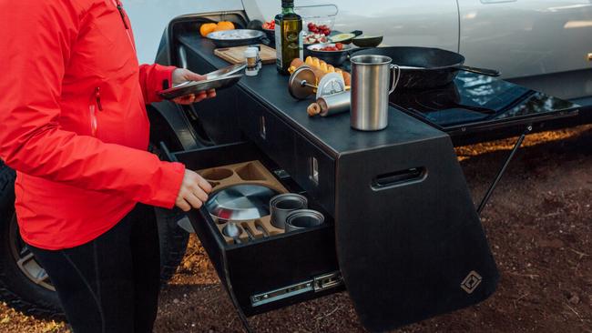 Electric ute start-up Rivian shows off its camping accessories at Overland expo.