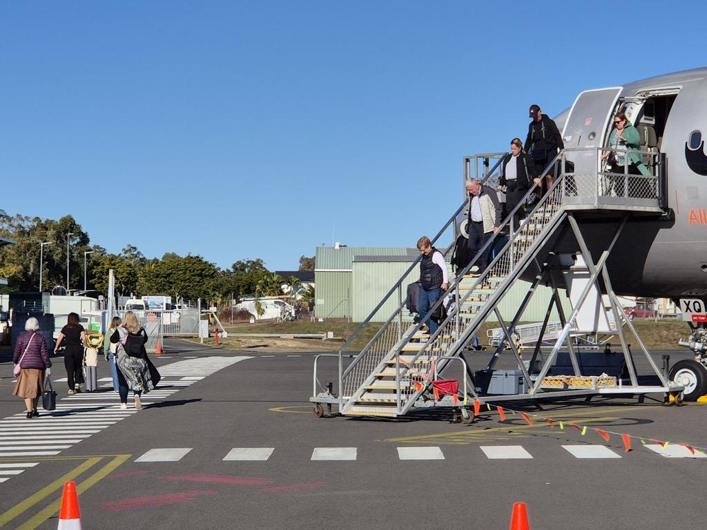 The first Melbourne arrivals at Hervey Bay airport.