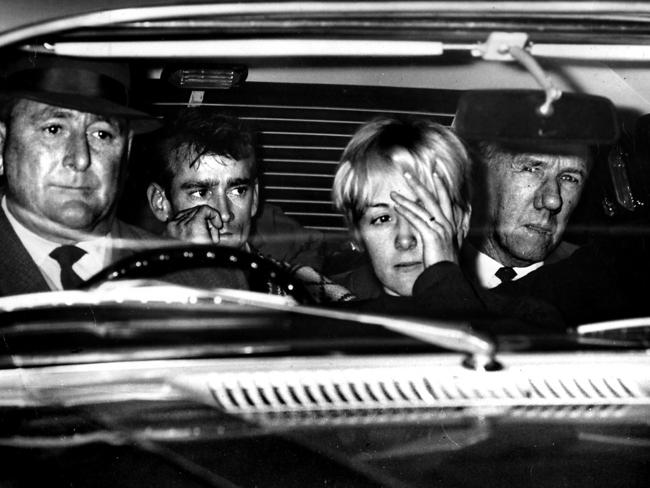 1968: Police drive petty criminal Wally Mellish, second left, with his new wife Beryl after finally ending the extraordinary, eight-day Glenfield siege in New South Wales. Mellish took girlfriend Beryl and her baby hostage at gunpoint after police visited their home to talk about stolen car parts. He insisted on being married to Beryl on the first day of the stand-off and they were wed by Reverend Clyde Paton, with Police Commissioner Norman Allan as best man. After finally being freed, Beryl said she would have the marriage annulled. File picture