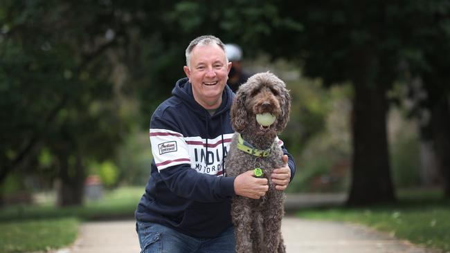 Grayham Bottomley was treated for an enlarged prostate and now problem solved. Grayham on a daily walk with his dog Molly at the park.                                                             Picture: David Caird