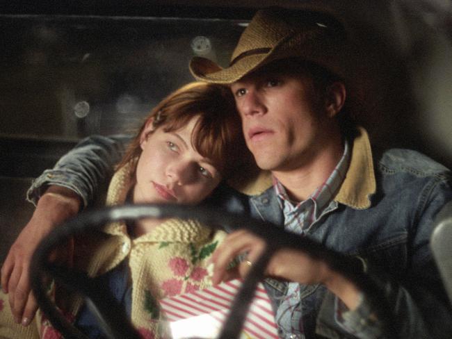 In love ... Michelle Williams and Heath Ledger in a scene from the film Brokeback Mountain.