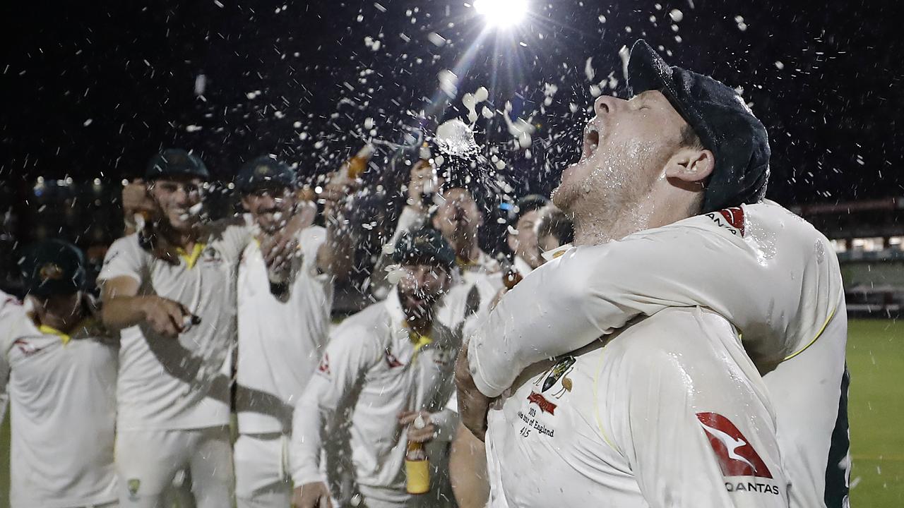 The Aussies let their hair down after retaining the Ashes at Old Trafford.