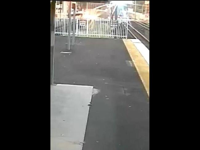 Moment power lines hit at Carseldine level crossing