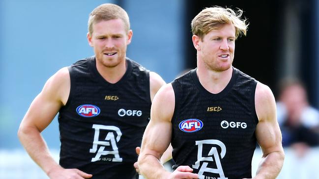 Tom Clurey and Tom Jonas in full stride at Port Adelaide training on Monday. Picture: Mark Brake (Getty).