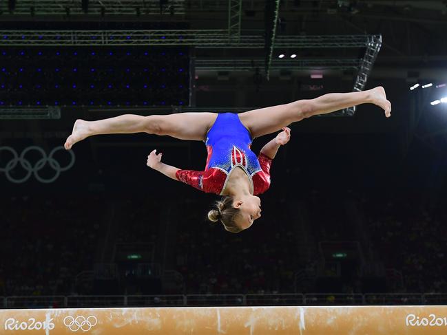 Russia's Daria Spiridonova competes in the qualifying for the women's Beam event of the Artistic Gymnastics at the Olympic Arena during the Rio 2016 Olympic Games in Rio de Janeiro on August 7, 2016. / AFP PHOTO / Emmanuel DUNAND
