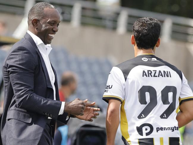 World Cup hopeful Daniel Arzani (right) celebrates with his Macarthur coach Dwight Yorke after scoring for the Bulls. Picture: Jenny Evans / Getty Images