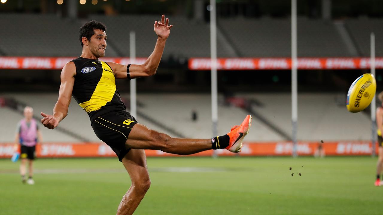 Marlion Pickett kicks for goal. Photo: Michael Willson/AFL Photos via Getty Images.