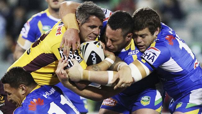 Corey Parker of the Broncos is tackled during the Round 13 NRL match against the Raiders in 2013, Photo: Getty Images