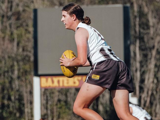 Ryleigh Wotherspoon in action for the Sherwood Magpies in QFAW Division 1. Picture: BrookeSleepMedia.