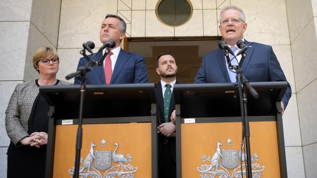 Prime Minister Scott Morrison announces the appointment of a permanent independent commissioner to investigate veteran suicide with (L-R) Australian Defence Minister Linda Reynolds, Australian Veterans' Affairs Minister Darren Chester and Liberal member Herbert Philip Thomson at Parliament House. (Photo by Tracey Nearmy/Getty Images)