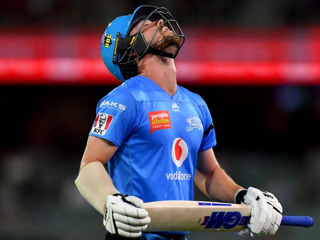 Travis Head of the Strikers reacts after being dismissed during the Big Bash League (BBL) cricket match between the Adelaide Strikers and the Hobart Hurricanes at Adelaide Oval in Adelaide, Sunday, January 26, 2020. (AAP Image/Sam Wundke) NO ARCHIVING, EDITORIAL USE ONLY, IMAGES TO BE USED FOR NEWS REPORTING PURPOSES ONLY, NO COMMERCIAL USE WHATSOEVER, NO USE IN BOOKS WITHOUT PRIOR WRITTEN CONSENT FROM AAP