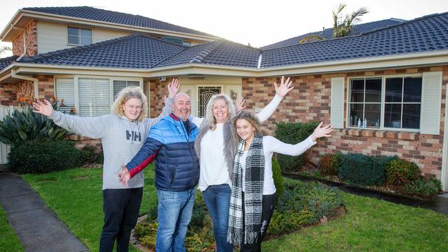 It’s a new start for Joanne Kelly, pictured with husband Tony, and kids Patty, 15, and Keilah, 14. Picture: Mark Stewart