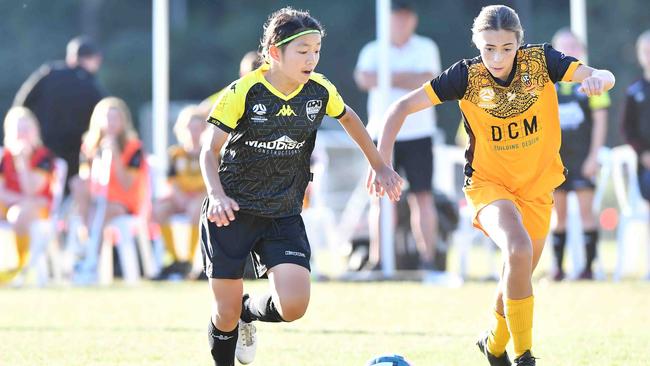 SOCCER: Junior football carnival, Maroochydore. Sunshine Coast Wanderers V Logan Lighting Maroon, junior girls. Picture: Patrick Woods.