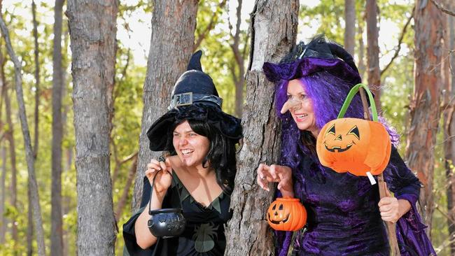 Halloween Fun: In Black Josie Laird with in purple  Shelley Strachan having some fun for Halloween. Costume courtesy of The Fancy Dress Ballroom. Photo Greg Miller / The Gympie Times. Picture: Greg Miller