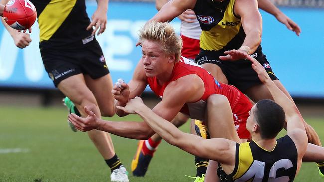 Isaac Heeney wins a contested possession. Picture: Michael Klein