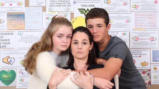 Sandra Brant, with children Allegra and Connor, is a former employee of BLK. She is seeking more than $40,000 in unpaid entitlements. Picture: AAP Image/Richard Gosling