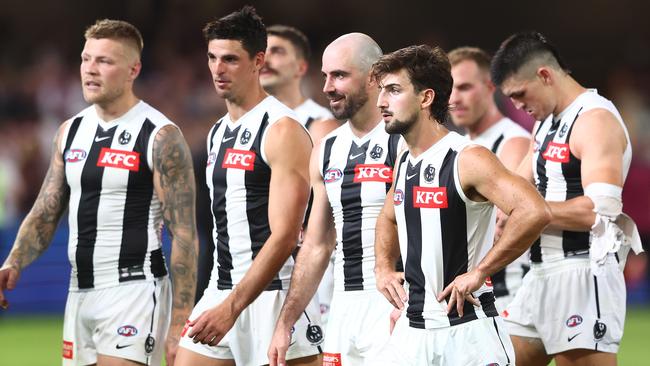 BRISBANE, AUSTRALIA - APRIL 06: Magpies leave the field after losing the round four AFL match between Brisbane Lions and Collingwood Magpies at The Gabba, on April 06, 2023, in Brisbane, Australia. (Photo by Chris Hyde/AFL Photos/via Getty Images )