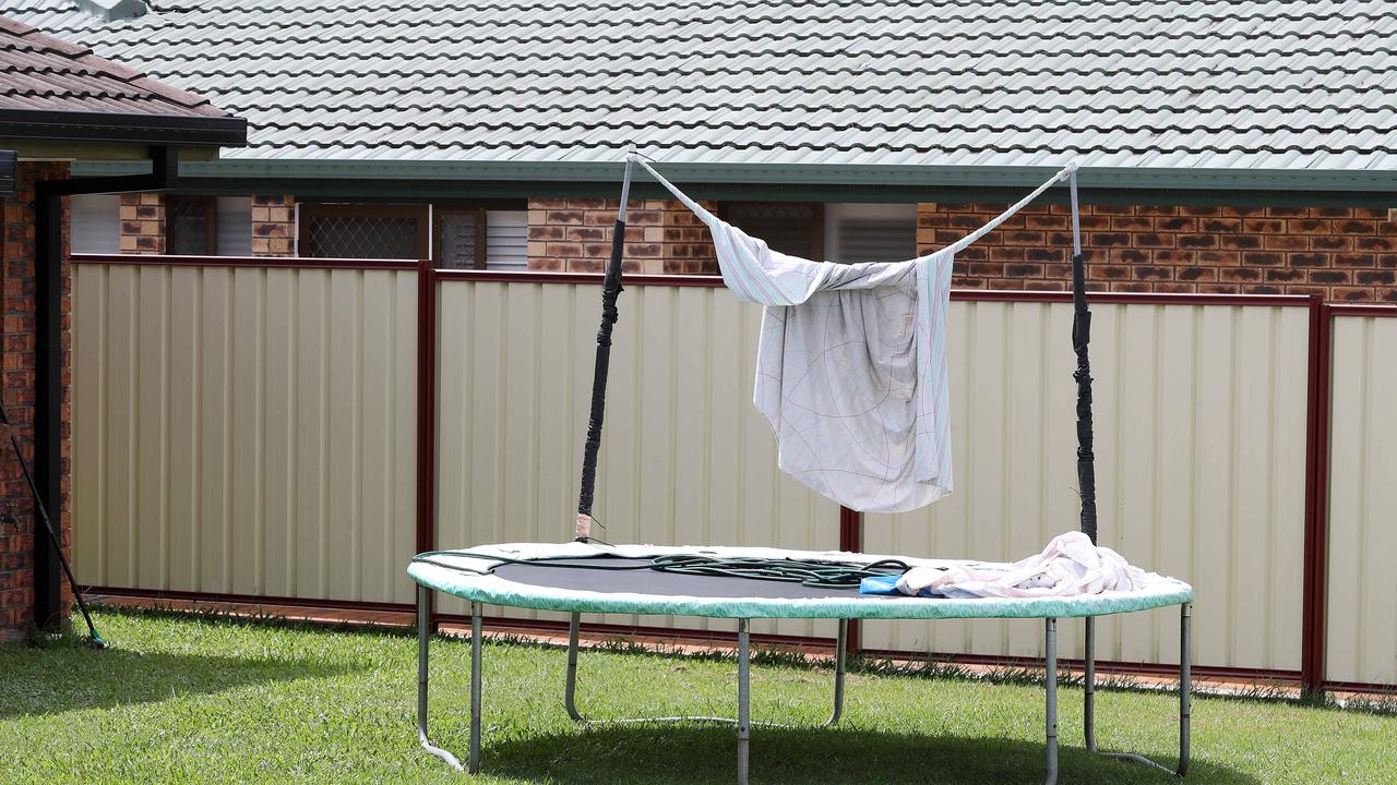 A trampoline with sheets hanging over the top. Photographer: Liam Kidston