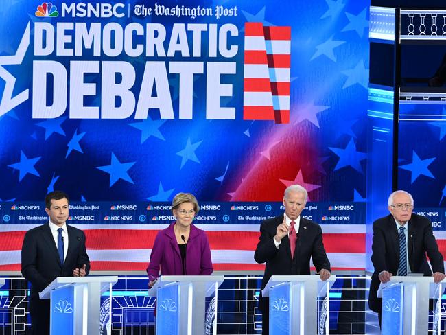 (L-R) Democratic presidential hopefuls Mayor of South Bend Pete Buttigieg, Massachusetts Senator Elizabeth Warren, Former Vice President Joe Biden and Vermont Senator Bernie Sanders participate in the fifth Democratic primary debate. Picture: AFP