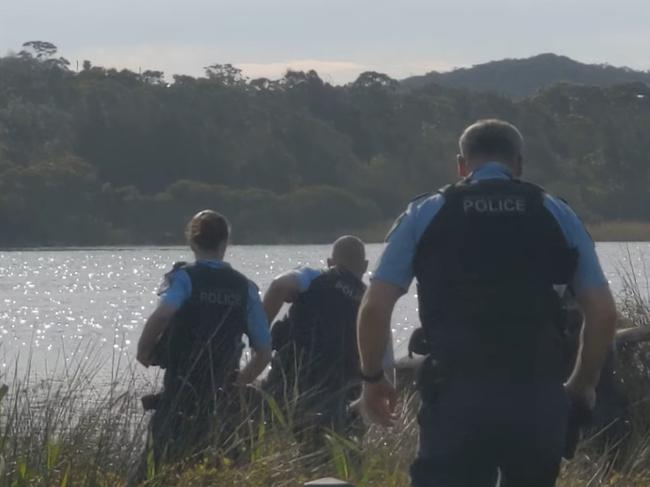 Police at Dee Why Lagoon on October 3, 2022, to arrest Joshua Smith after a tent was set alight in the sand dunes. Picture: Facebook