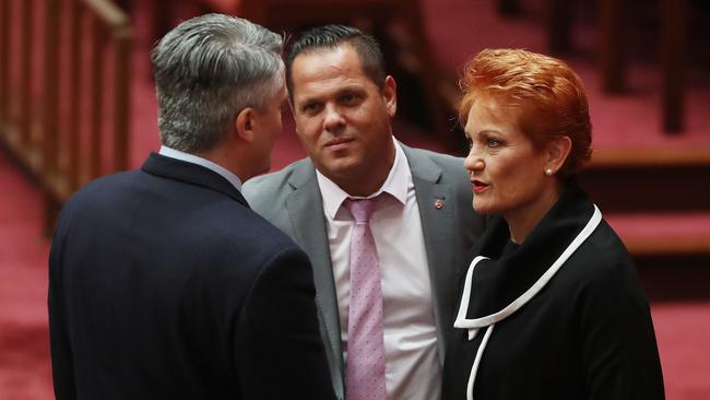 Senator Mathias Cormann, Senator Peter Georgiou and Senator Pauline Hanson after the company tax bill was blocked. Picture: Kym Smith