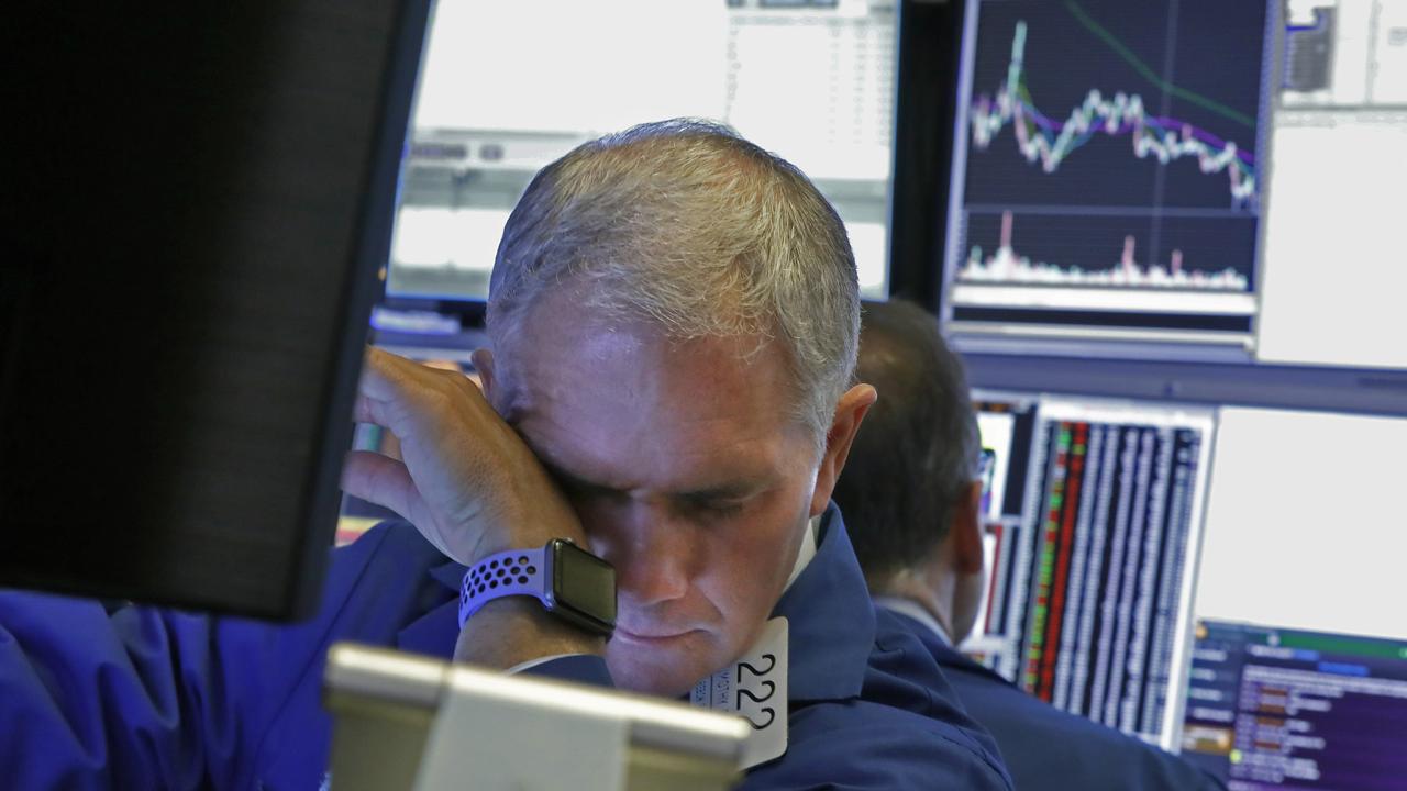 The Dow Jones crumbled nearly 10 per cent overnight. Picture: AP Photo/Richard Drew