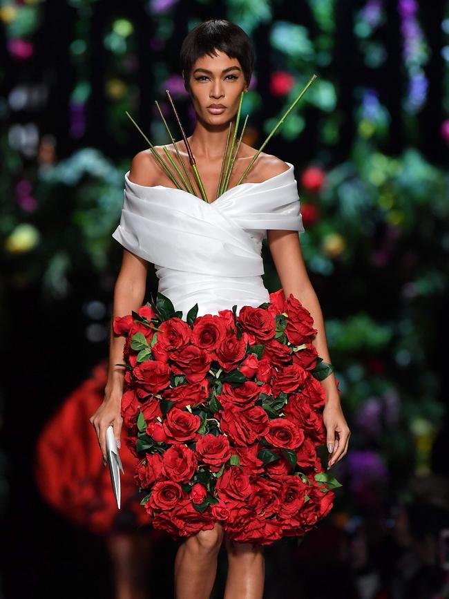 Jeremy Scotts collection for Moschino included a bouquet of looks inspired by flowers, from an orchid to a floral bouquet to a bunch of roses. Picture: AFP