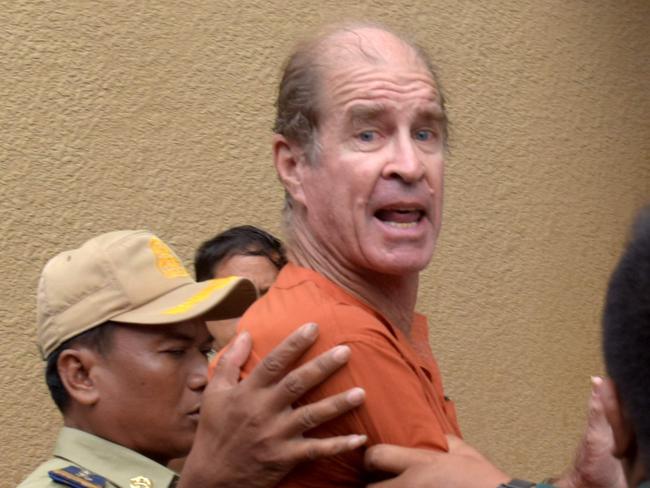 Australian filmmaker James Ricketson arriving in Phnom Penh court during his trial.  Picture: TANG CHHIN Sothy / AFP