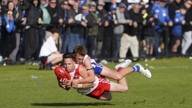 Blake Pullen tackles Karingal’s Mitch Glenn in last season’s grand final. Picture: Valeriu Campan