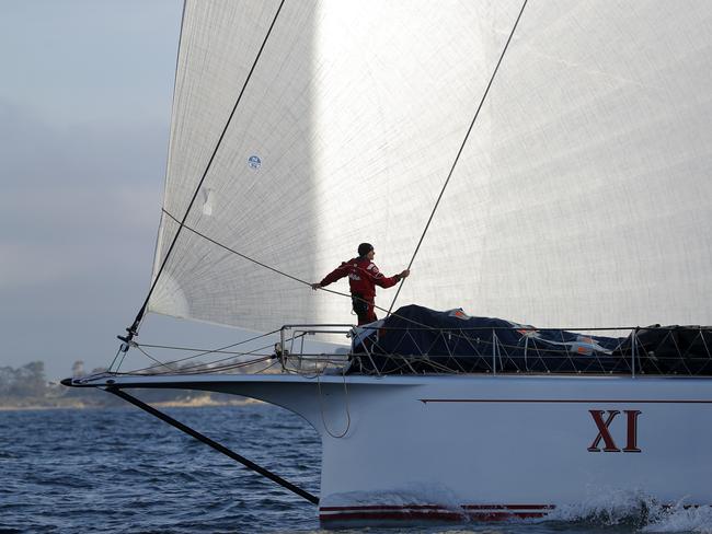 Wild Oats XI skippered by Mark Richards sails up the River Derwent on her way to a 9th line honours victory in the 2018 Sydney to Hobart Yacht Race. The yacht crossed the line in 1d 19hrs 7mins 21secs . Picture: RICHARD JUPE