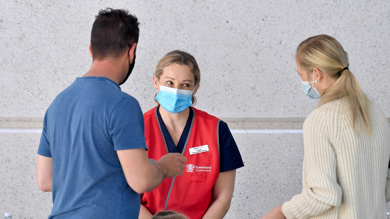 Lines of people at the Brisbane vaccination hub at Brisbane Convention and Exhibition Centre after a record-breaking weekend leads Queensland several steps closer to opening its borders. Picture: NCA NewsWire / John Gass