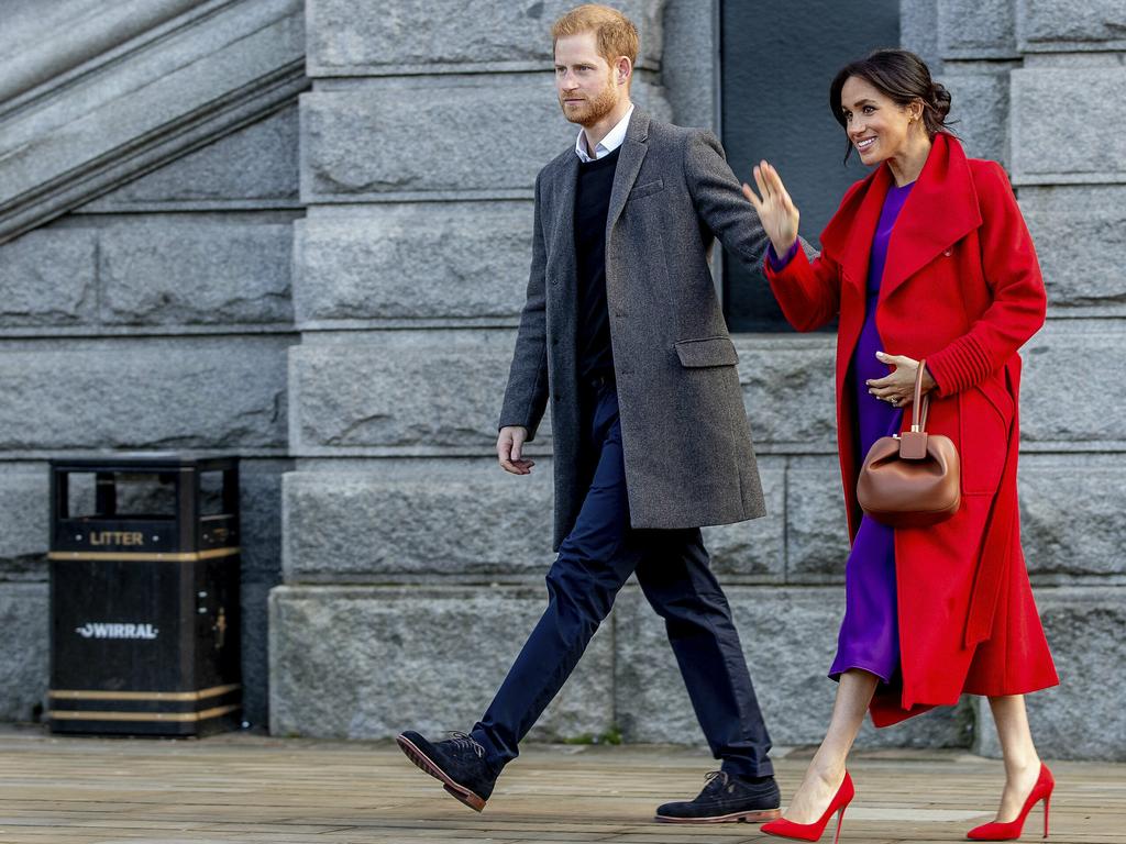 The Duke and Duchess of Sussex greet the crowds during a visit to Birkenhead, northwest England. Picture: Charlotte Graham/AP