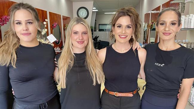 Heidi Mitchell, Shiloh Hobbs and Maddie and Emily Farmer at five-star rated Maddies Hair Bar hair and beauty salon on Lannercost Street in the Ingham CBD. Owner Maddie and her team of professional stylists are battling back against the odds in the wake of the Hinchinbrook flood disaster that has left local businesses reeling. Picture: Cameron Bates