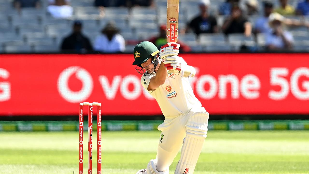 Joe Burns of Australia swings at a ball.