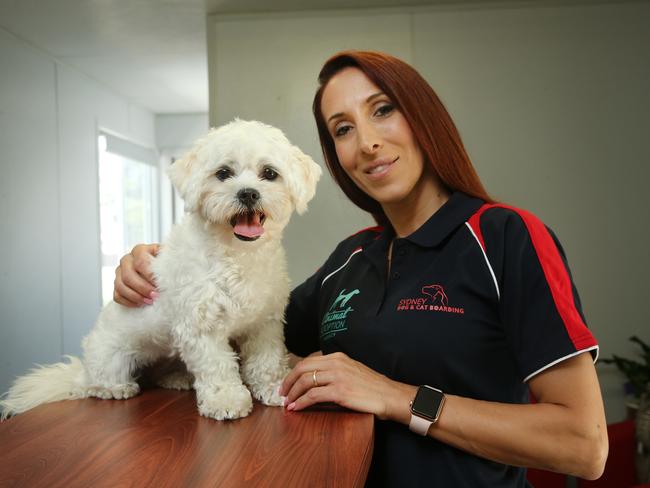 Animal Adoption Agency co-owner Fiona Amiti with Chloe. Picture: Richard Dobson