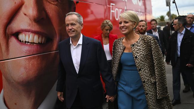 Opposition Leader Bill Shorten and his wife Chloe on the camping trail in Melbourne yesterday. Picture: AAP