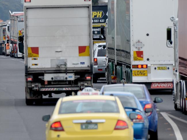 Traffic is banked back at a checkpoint on the Hume Freeway heading out of Melbourne at Donnybrook. Picture: Andrew Henshaw