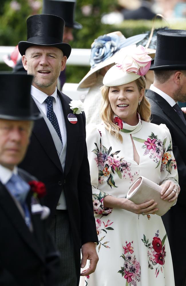 Peter Phillips’ wife, Autumn, and Zara Tindall’s husband, Mike. Picture: AP