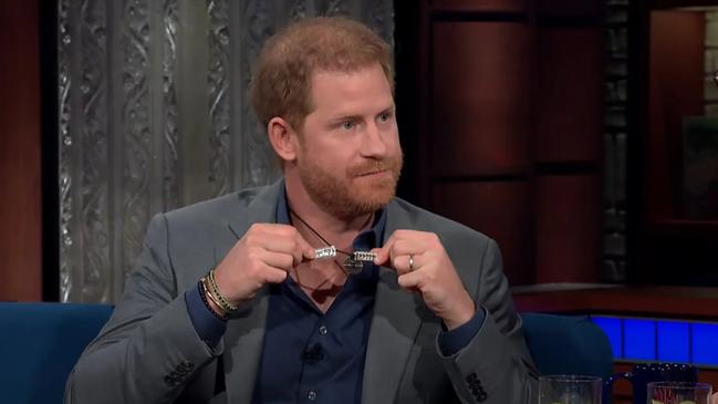 Prince Harry shows off a broken necklace on The Late Show with Stephen Colbert. Picture: CBS