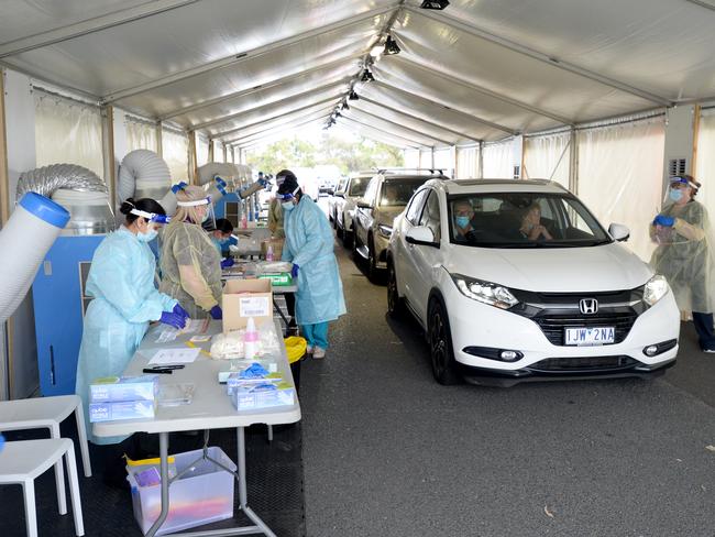 People queue for COVID tests at the Don Tatnell Leisure Centre, Parkdale. Picture: Andrew Henshaw