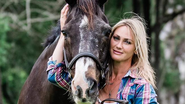 Laura Cheshire with horse Cadillac in a Save A Horse Australia calendar. Picture: Supplied