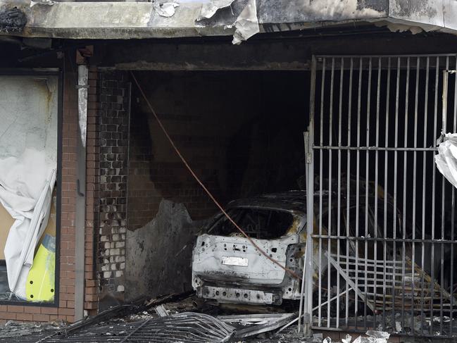 A tobacco shop on Cheviot Rd in Campbellfield lies in ruin after it was destroyed in an arson attack. Picture: Andrew Henshaw