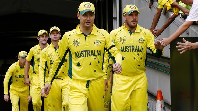 AUSSIE WORLD CUP WARM UP Australia v UAE Michael Clarke leads the team onto the mcg Picture:Wayne Ludbey