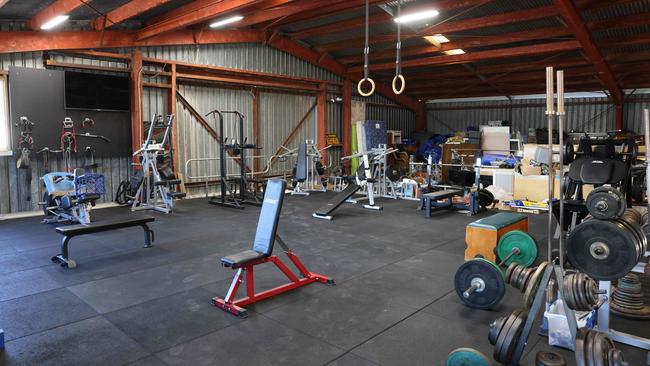 In the main shed, the blokes hit the gym each day. Picture: David Swift