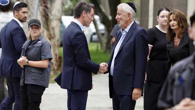 Premier Chris Minns, centre left, arrives at the Central Synagogue in Bondi, Sydney, on Friday. Picture: Jonathan Ng