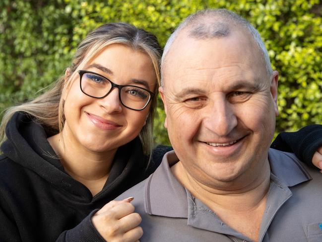 MELBOURNE, SEPTEMBER 5, 2023: Steph Fisher pictured with her dad, Glenn. Steph saved her dad's life last year after finding him unresponsive and not breathing. The then-21-year-old called Triple Zero and calmly followed the instructions to perform CPR for six minutes until paramedics arrived. Picture: Mark Stewart